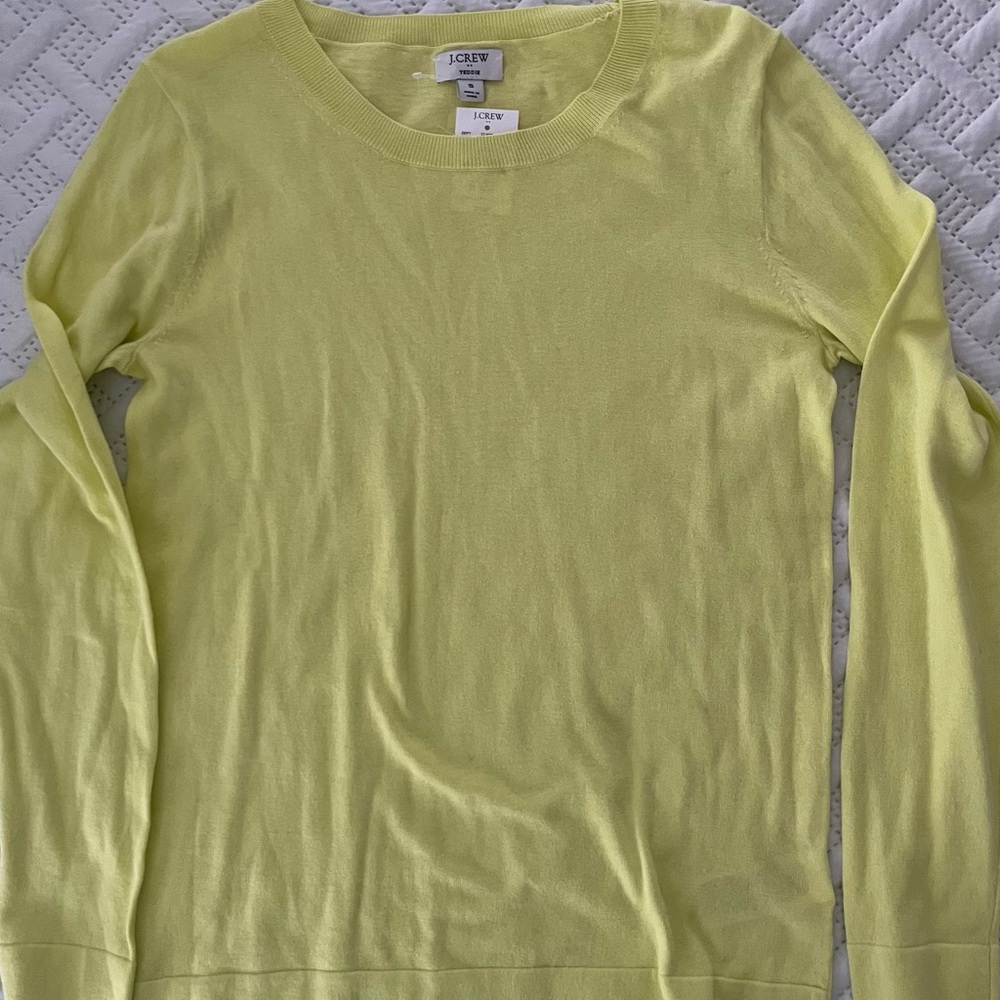 Bright yellow sweater